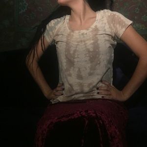 Worn in pastel tie-dye t-shirt